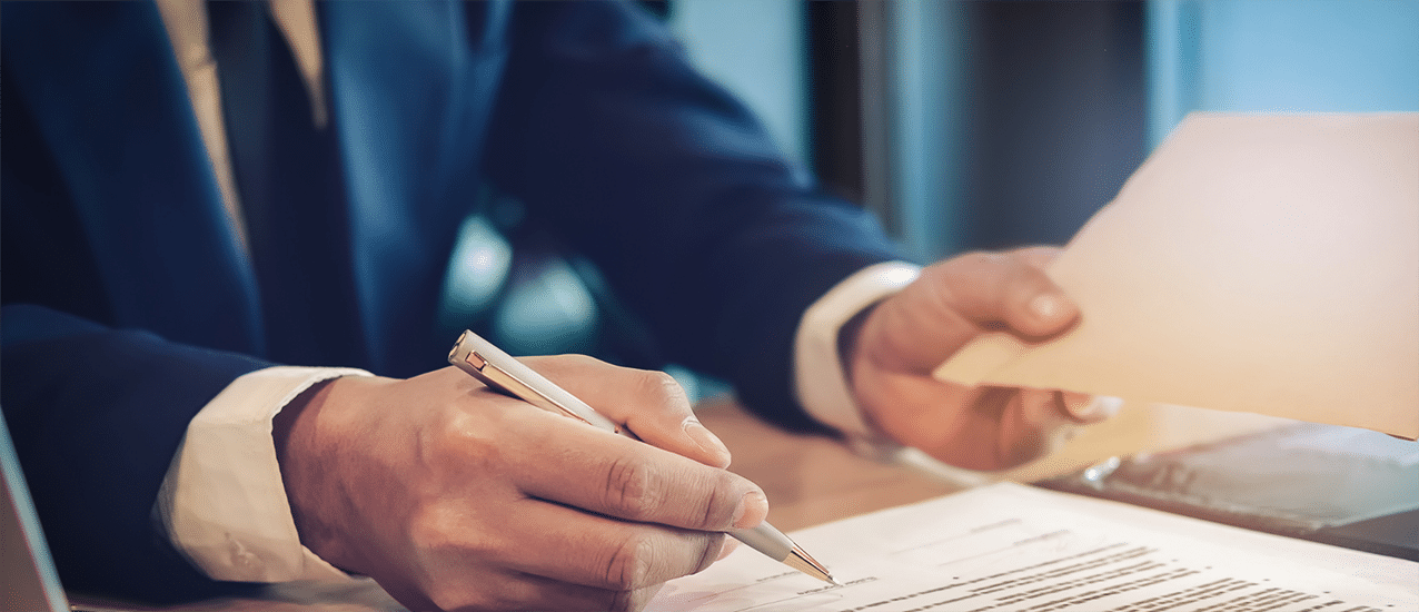 Man making notes to document